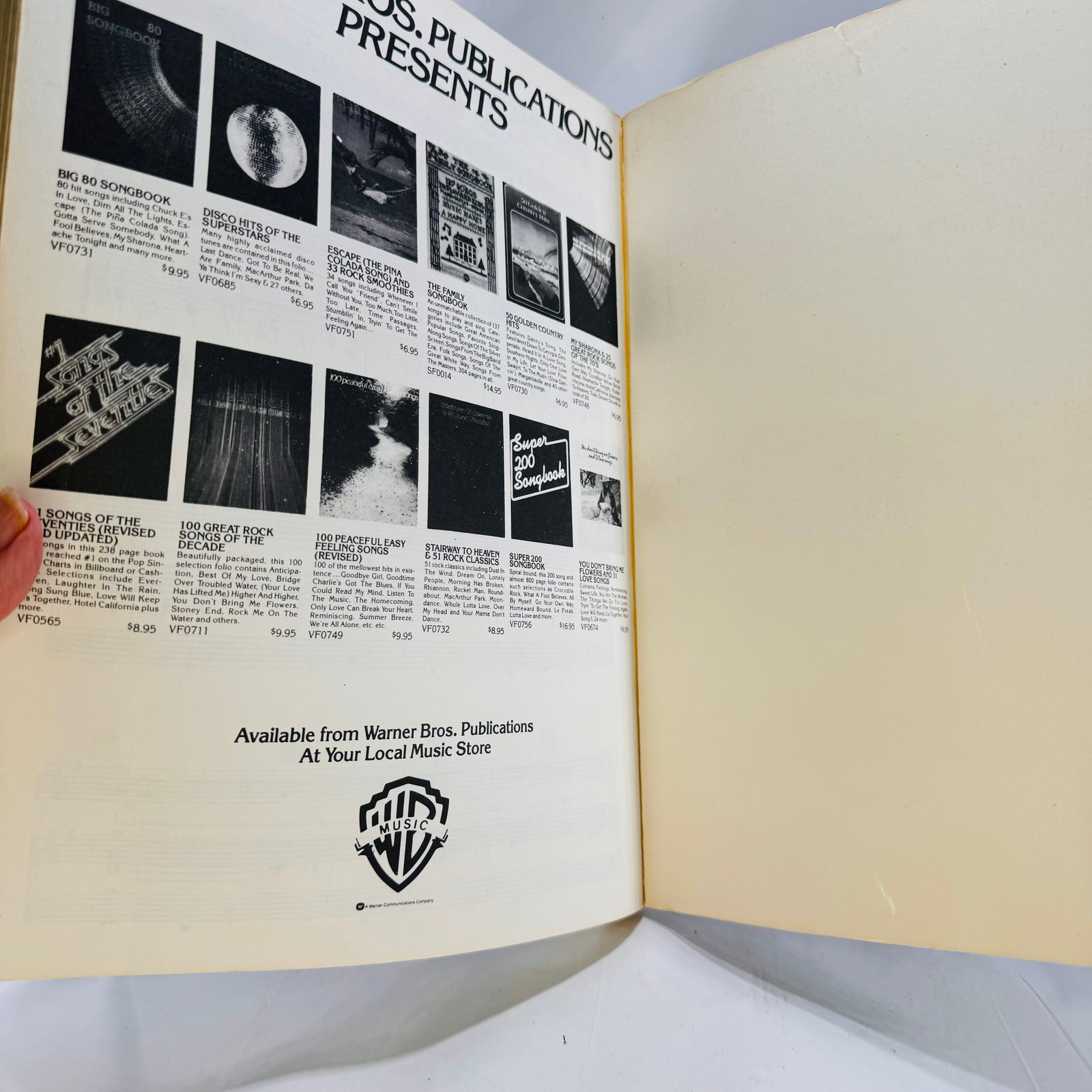 Warner Bros. Publications Presents ad on the inside back page