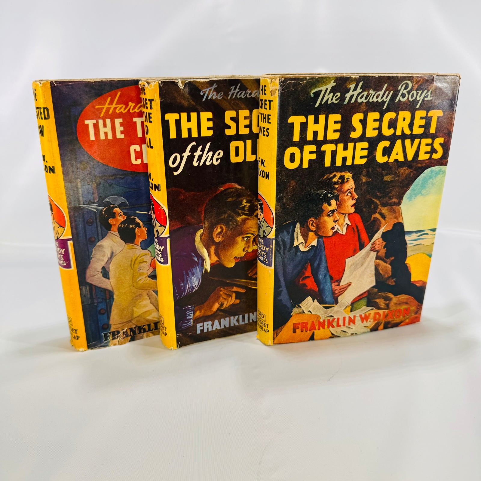 The Hardy Boys The Secret of the Old Mill 1927 The Secret of the Caves 1929 The Twisted Claw 1939 by F.W. Dixon Grosset and Dunlap