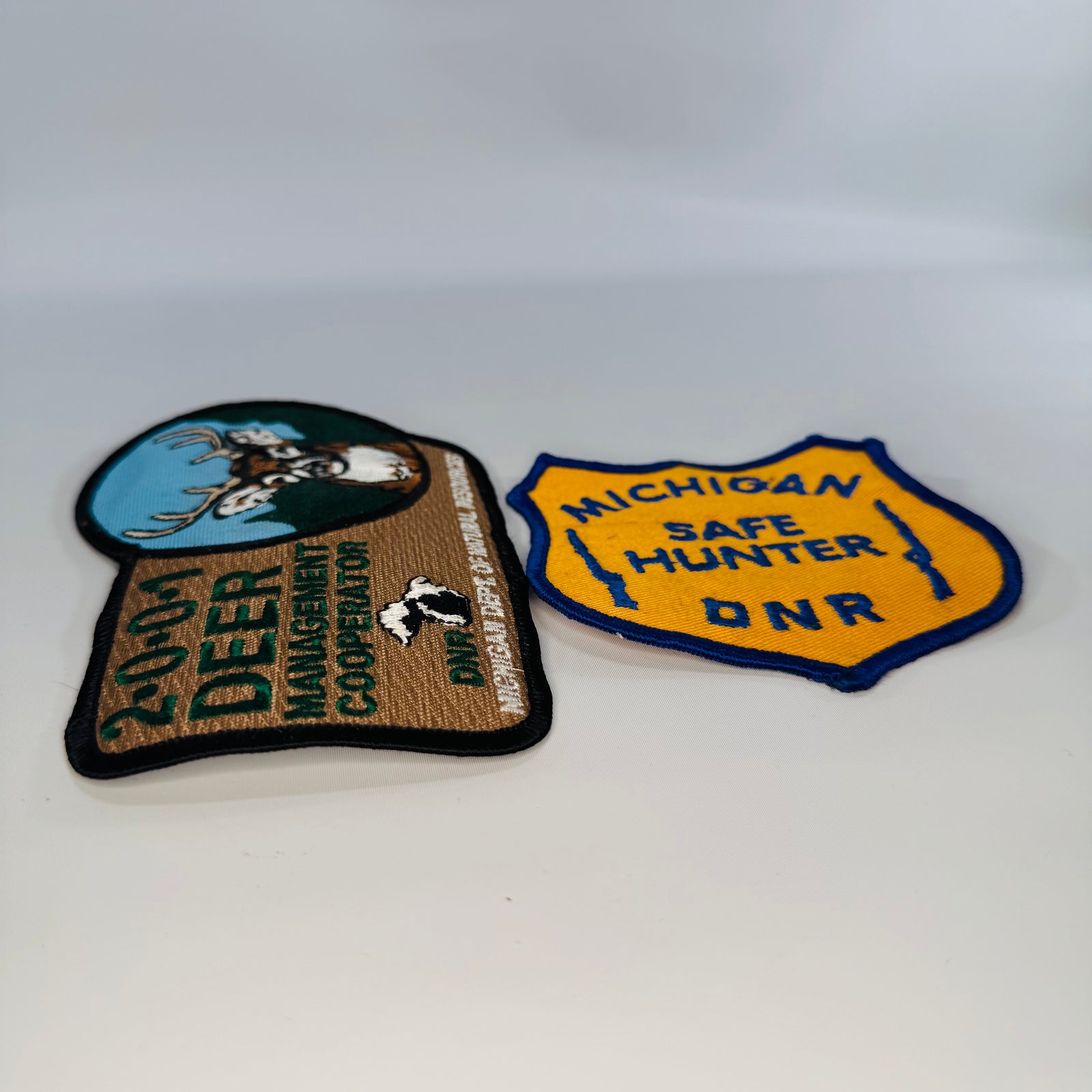 Michigan DNR Patch Set (2) – 2001 Deer Management Cooperator + Michigan Safe Hunter DNR
