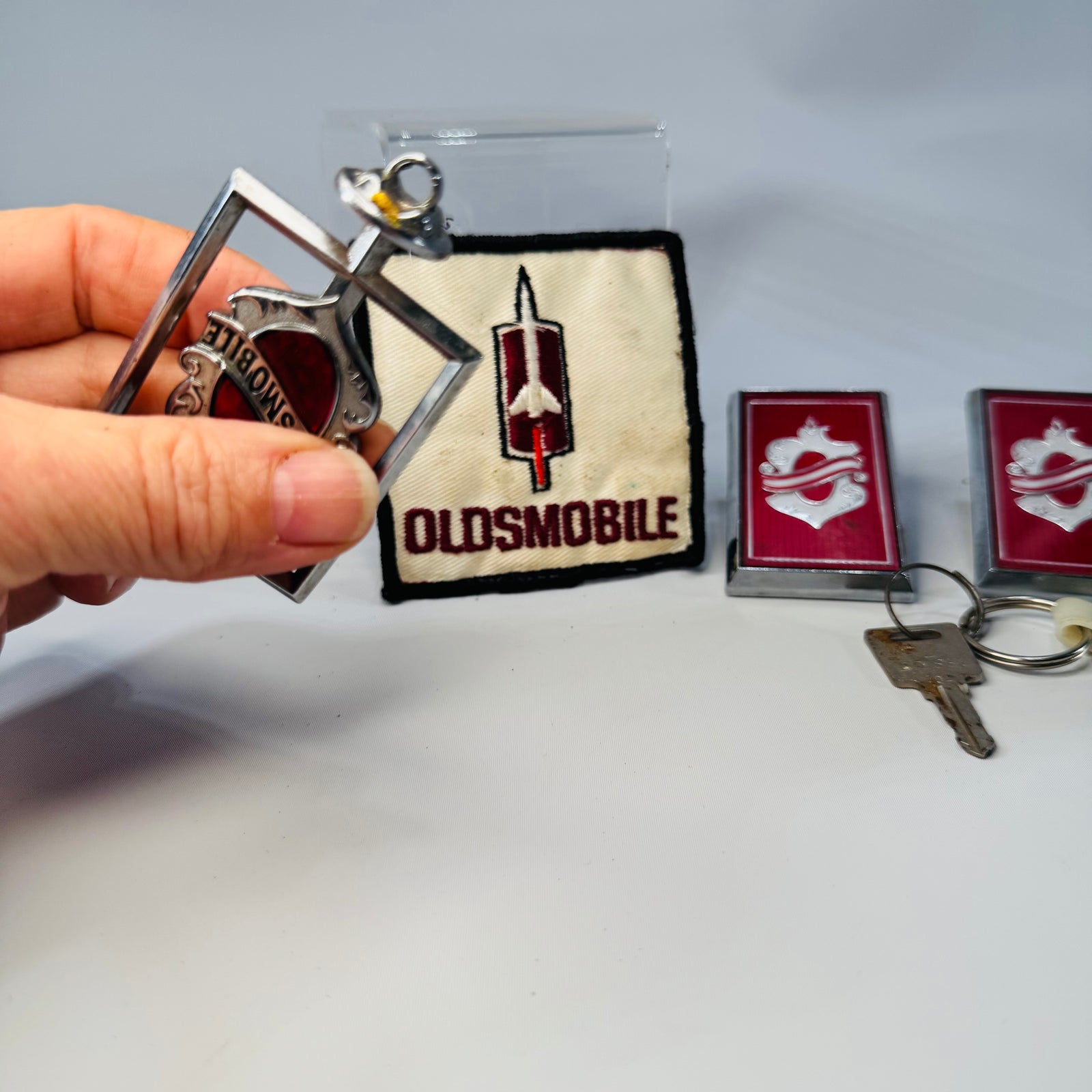 Vintage Oldsmobile Memorabilia Bundle – Patch, Keychain & Emblems Lot