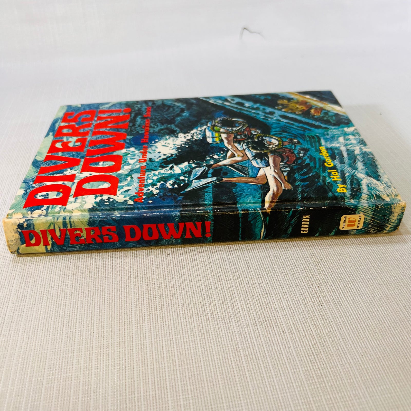 Spine and front board of Divers Down! Adventure Under Hawaiian Seas 1971