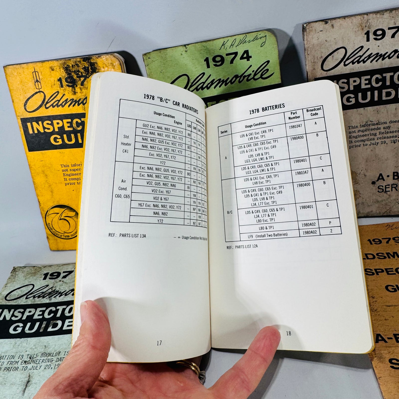 Vintage Oldsmobile Inspector’s Guide Lot (1973–1979) — 8 Pocket Manuals, Codes & Specs (Cutlass / 88 / 98 / F-85 / A-B-C)