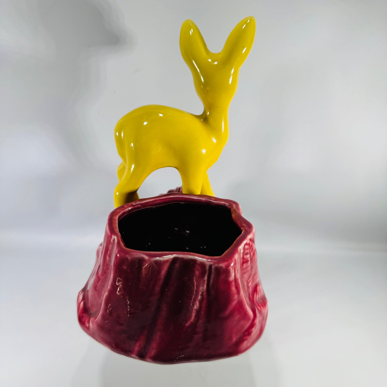 Vintage Shawnee Pottery Deer Planter | yellow fawn ceramic figural planter on maroon stump base