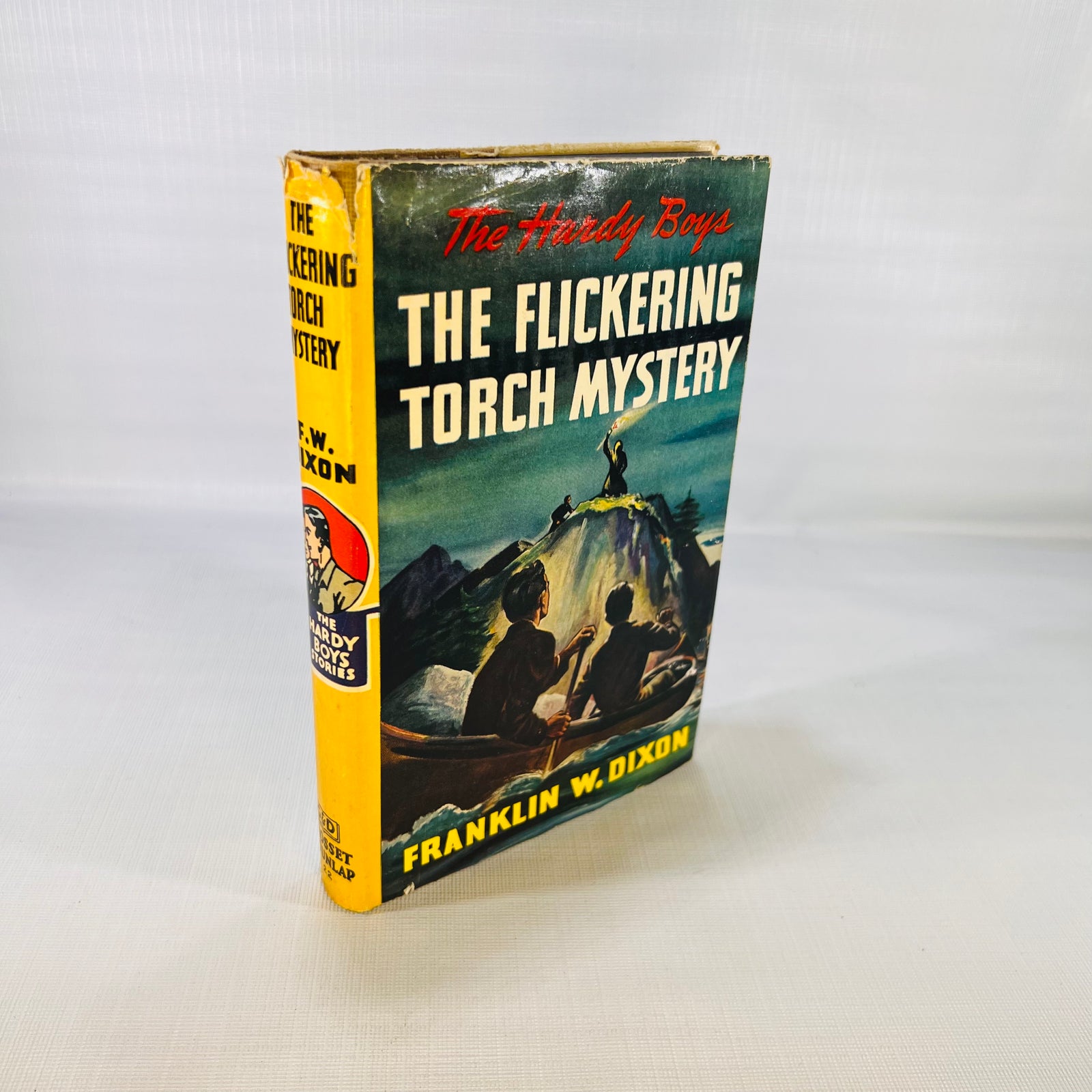 The Hardy Boys The Flickering Torch Mystery 1943, front of the pictorial dust jacket