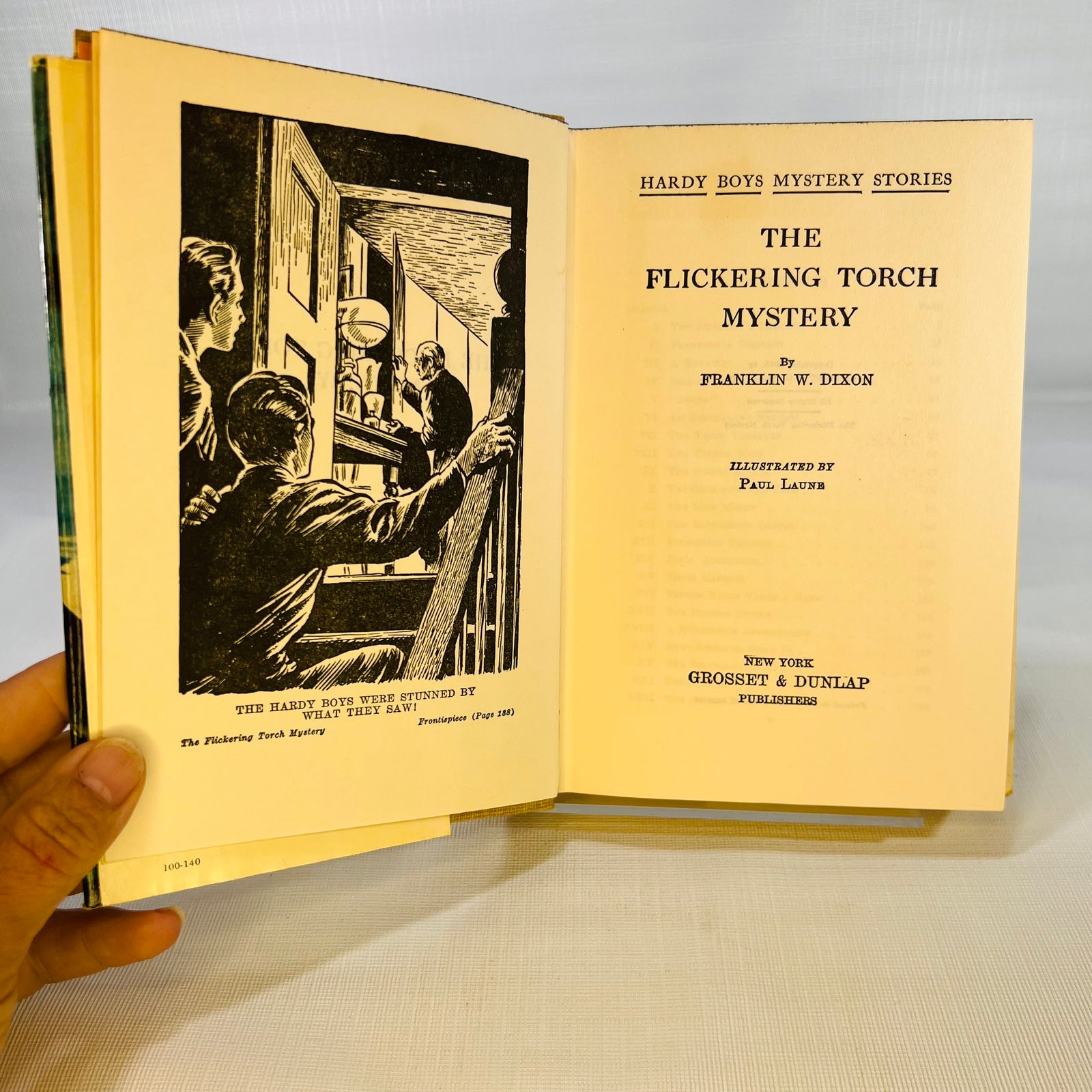 Frontispiece and title page, The Flickering Torch Mystery, illustrated by Paul Laune