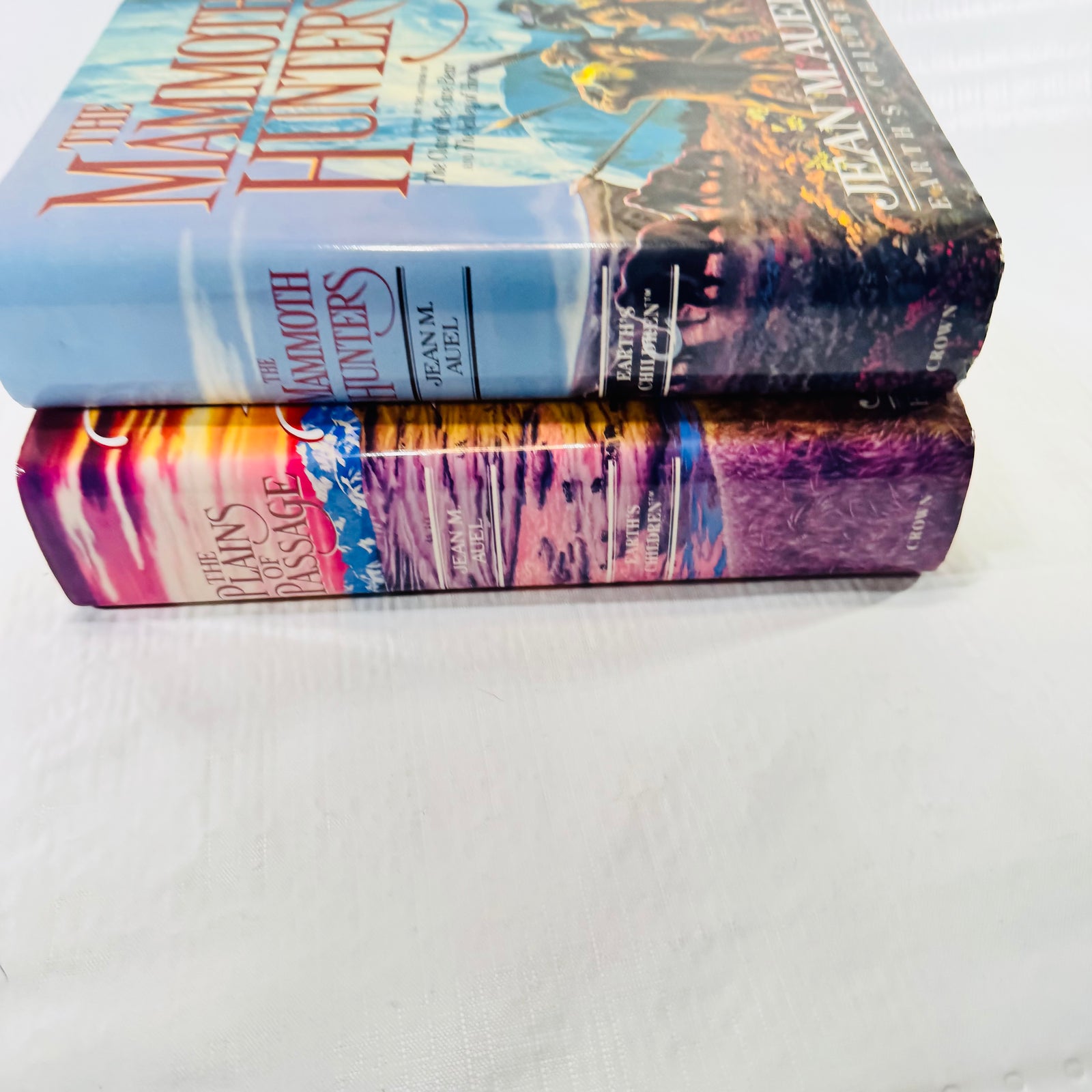 Spines of both books side by side with Crown printed at the base