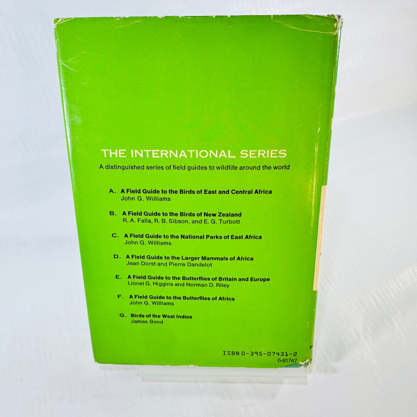 Back dust jacket of Birds of the West Indies with The International Series book list, ISBN 0-395-07431-2, and worn edges and corners.