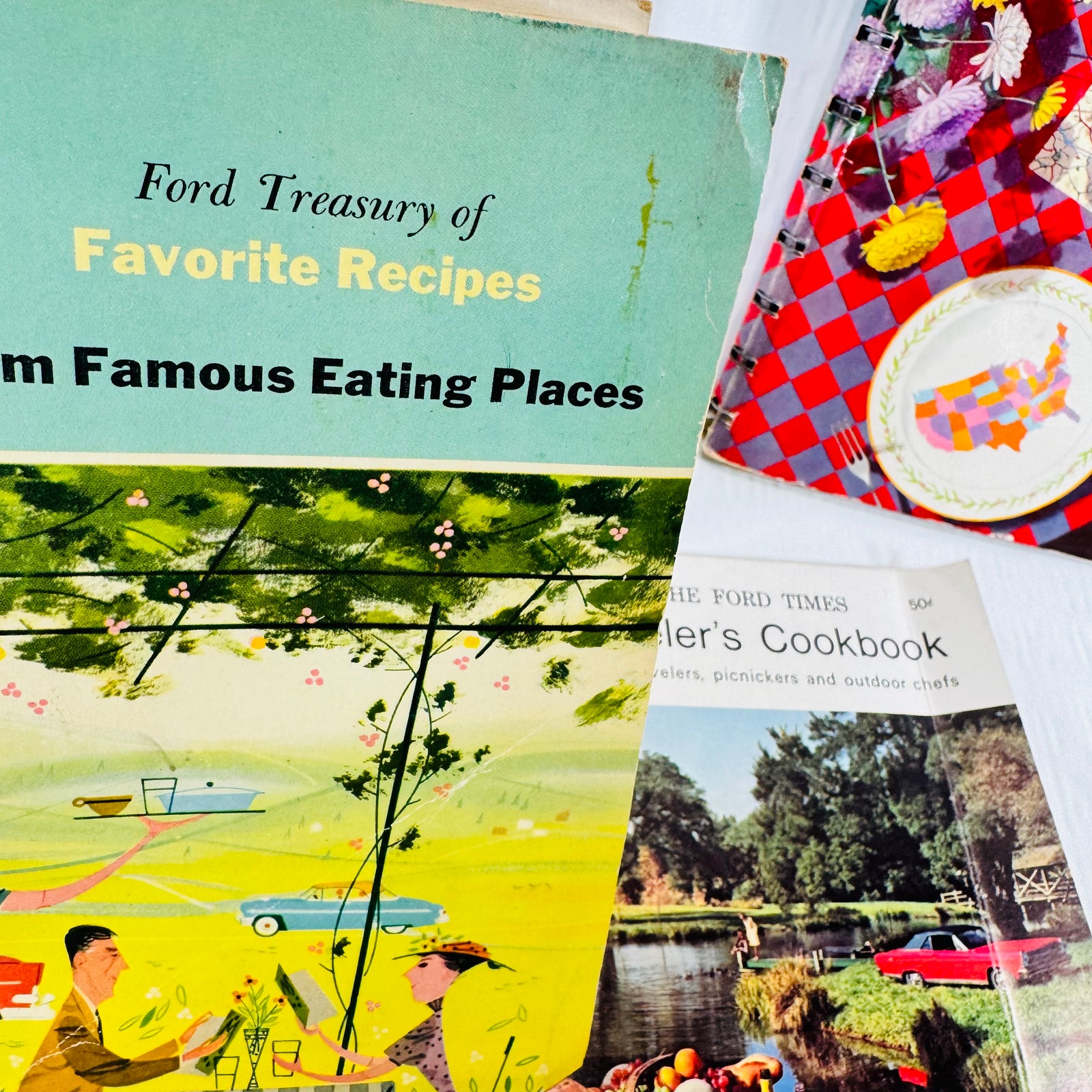 Volumes 2 and 3 overlapping the Traveler's Cookbook cover
