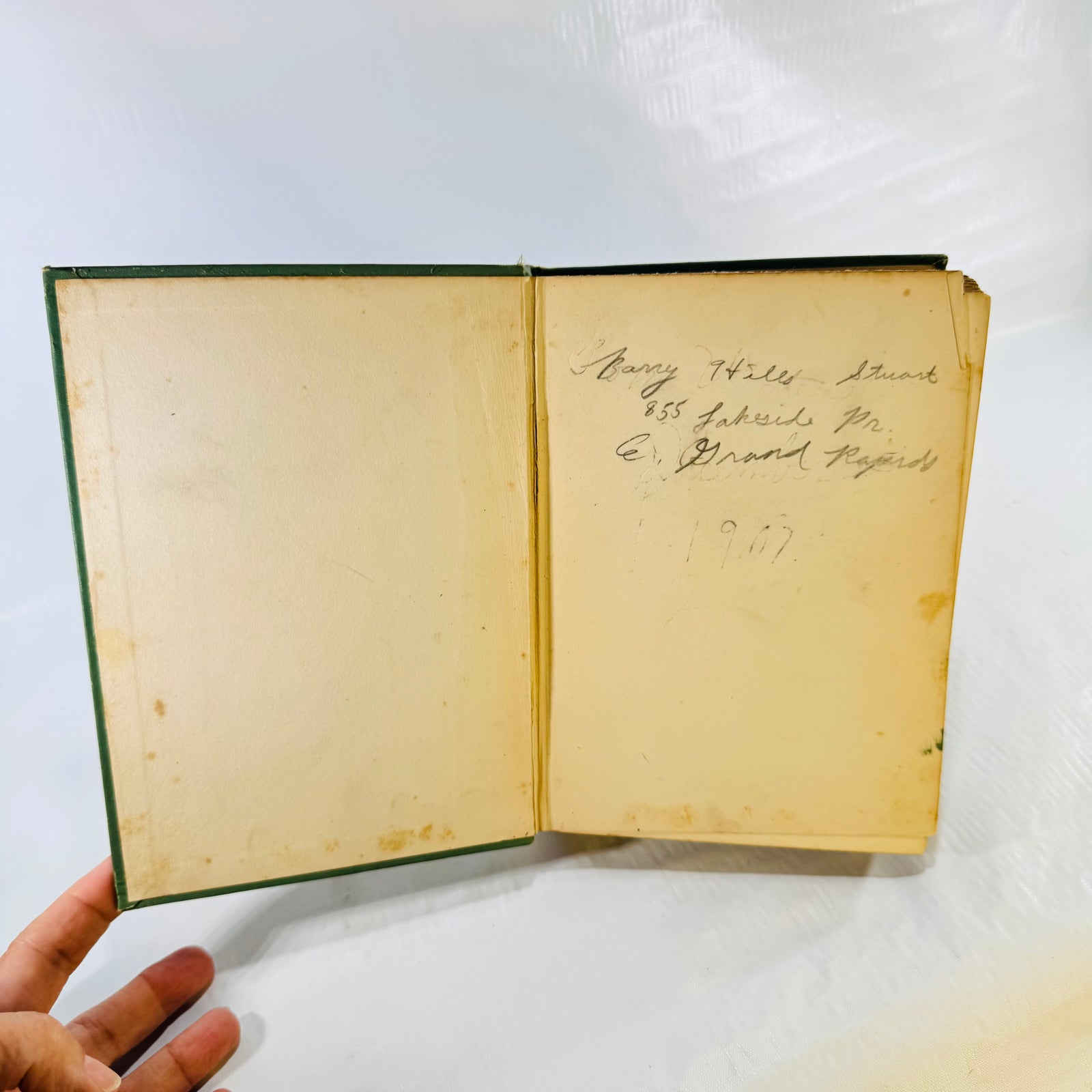 Front endpaper with early owner's pencil inscription dated 1907