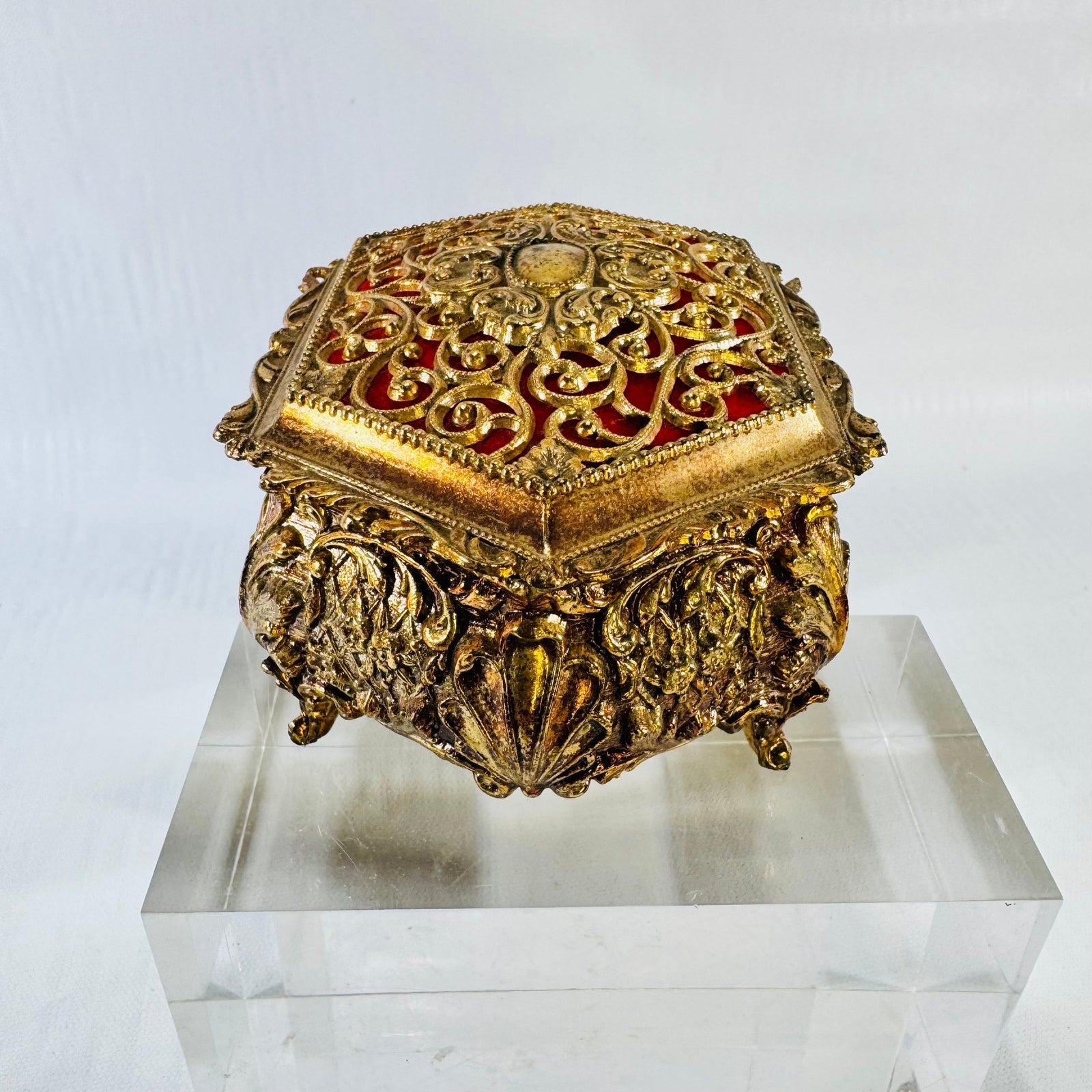 Vintage ornate gold tone metal jewelry casket with red fabric lining, photograph 6 of 9