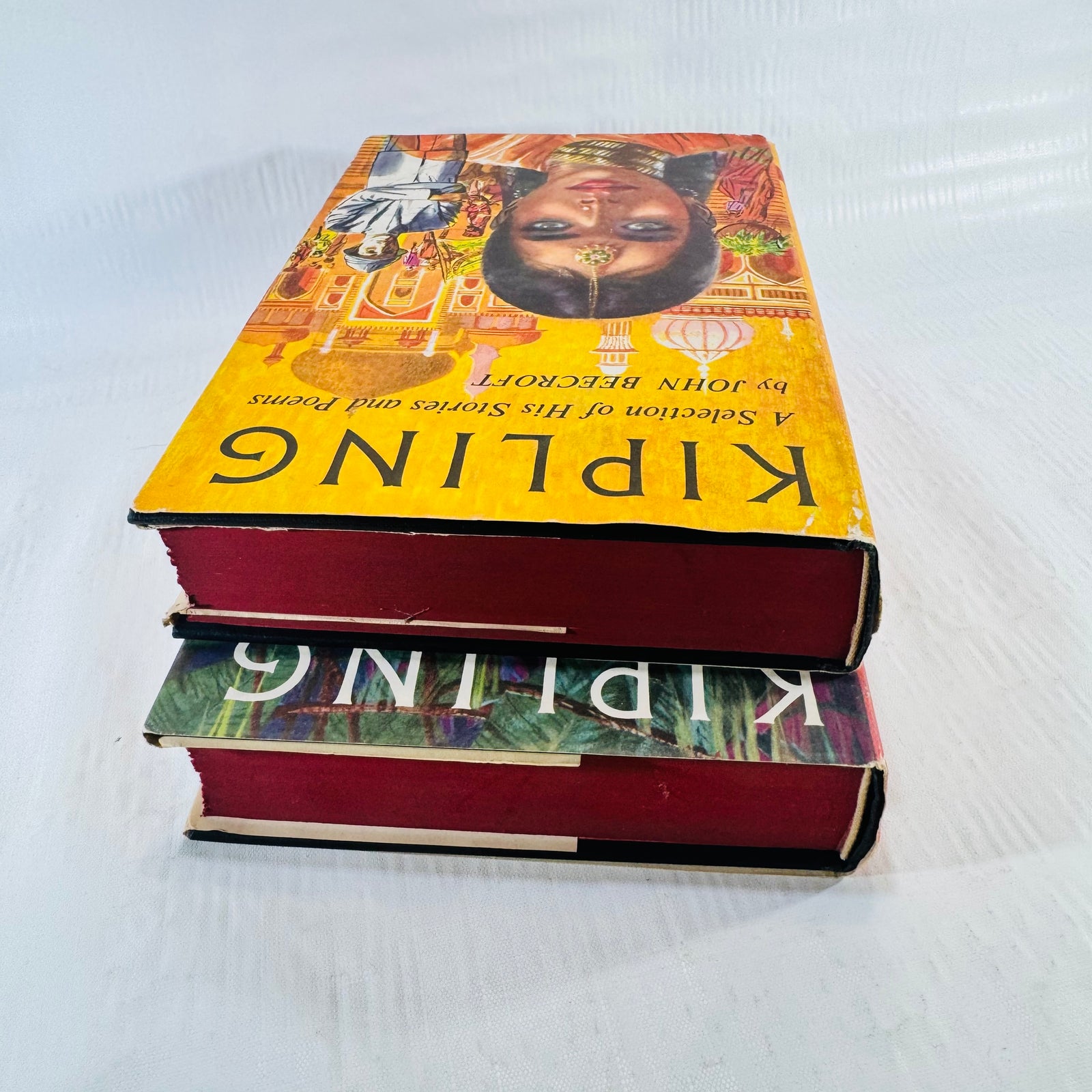 Stacked volumes showing the red stained top page edges
