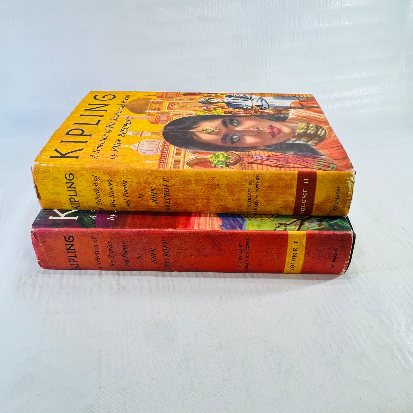 Spines of both volumes with Volume I and Volume II boxes at the foot