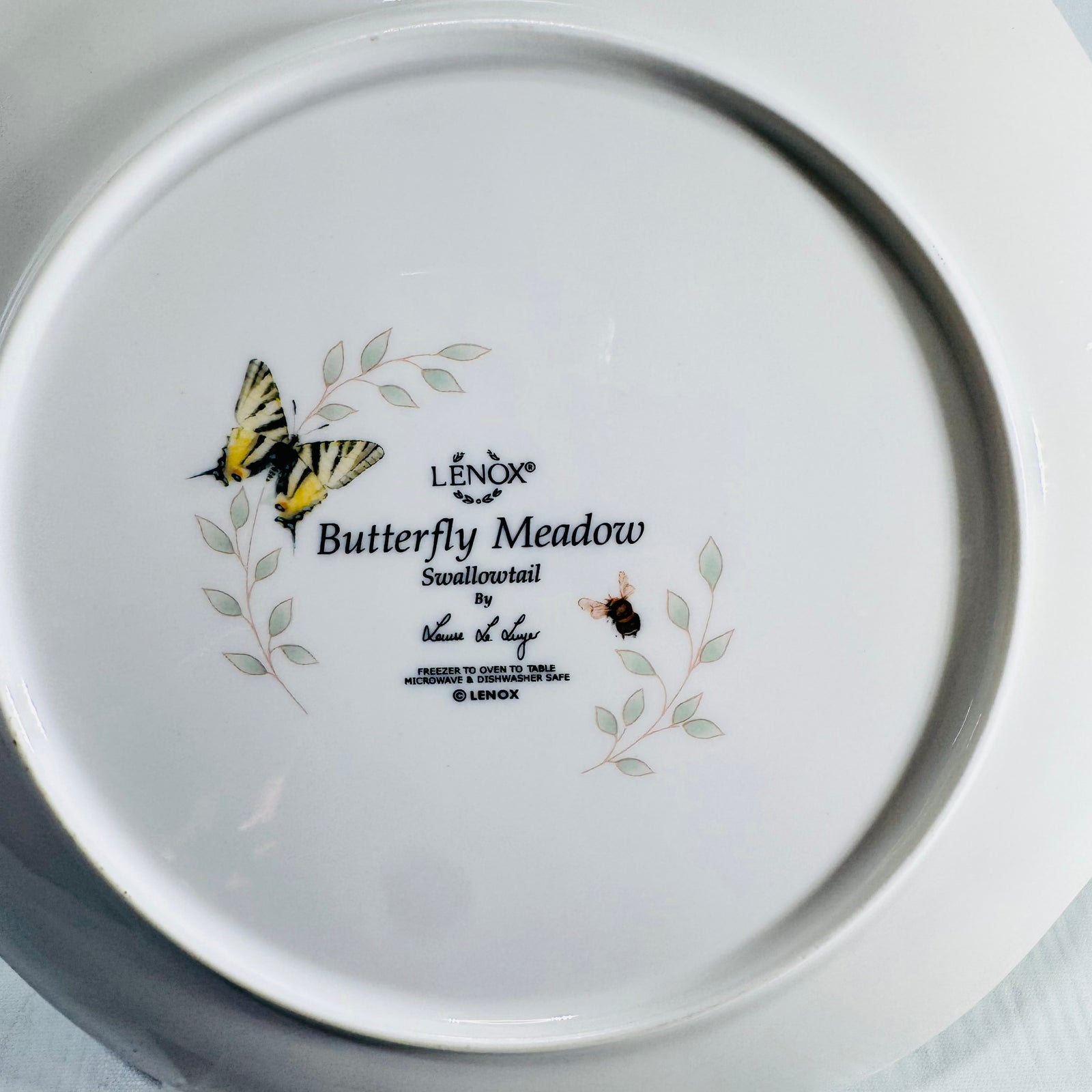 Close view of Lenox Butterfly Meadow Swallowtail backstamp with designer signature and butterfly art