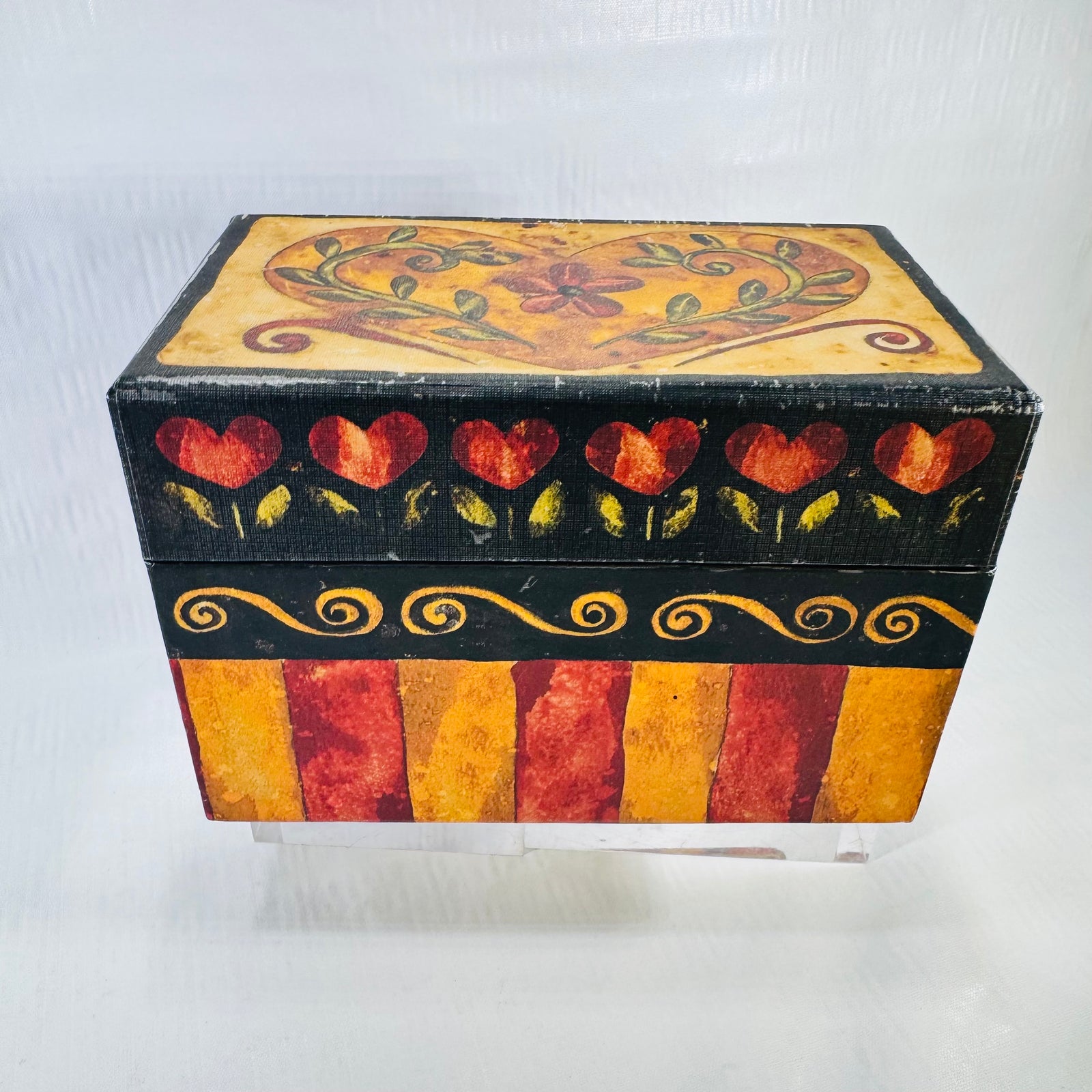 Front of the Karen Hillard Crouch Romance recipe box with red hearts, gold swirls, and stripes