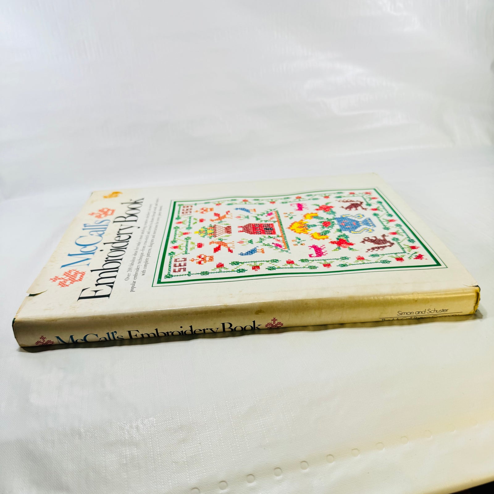 McCall's Embroidery Book spine with toning, Simon and Schuster