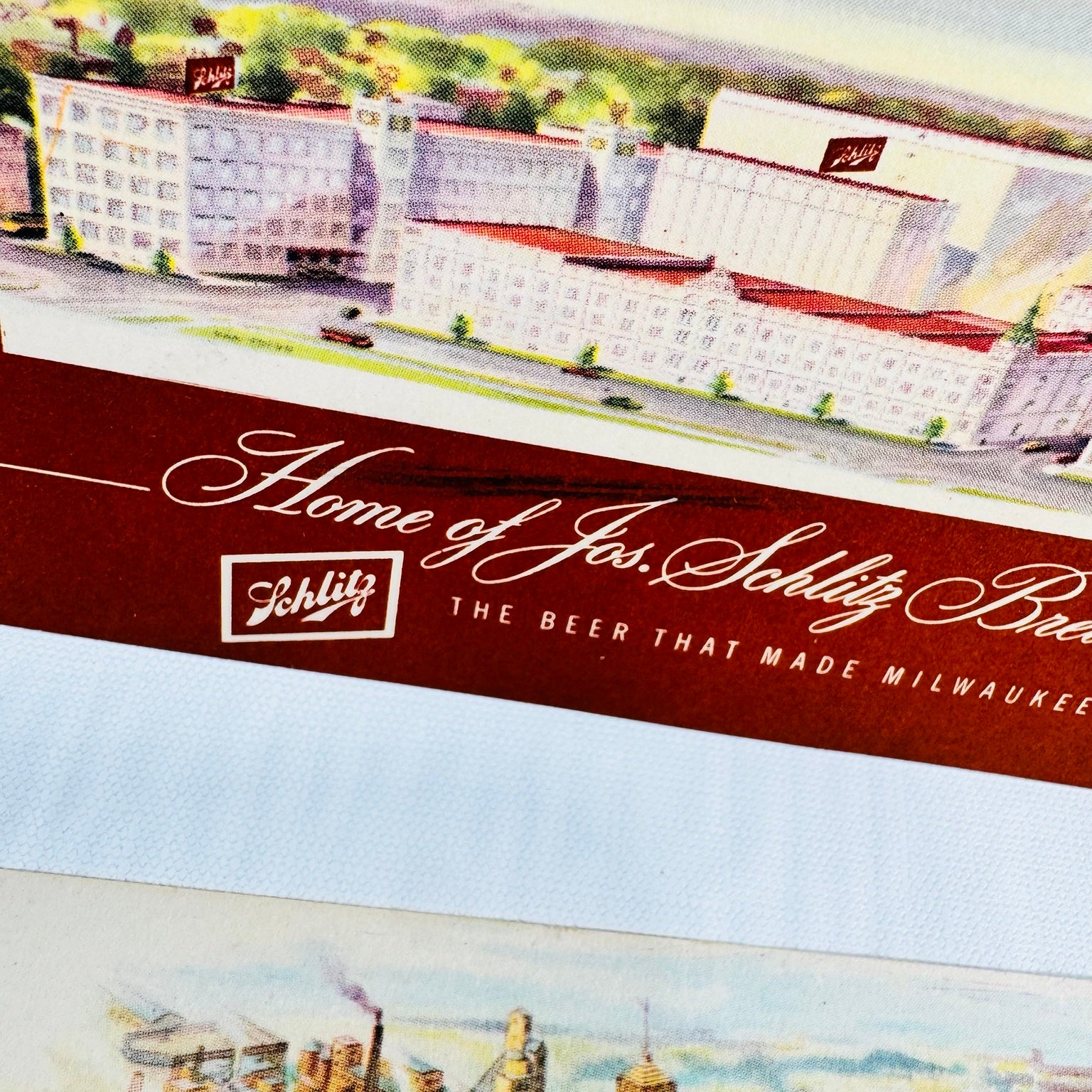 Schlitz brewery postcard front detail showing buildings and printed brewery name
