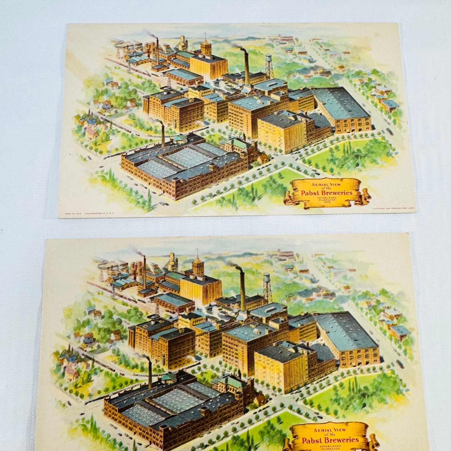 Two matching Pabst Breweries aerial view postcard fronts