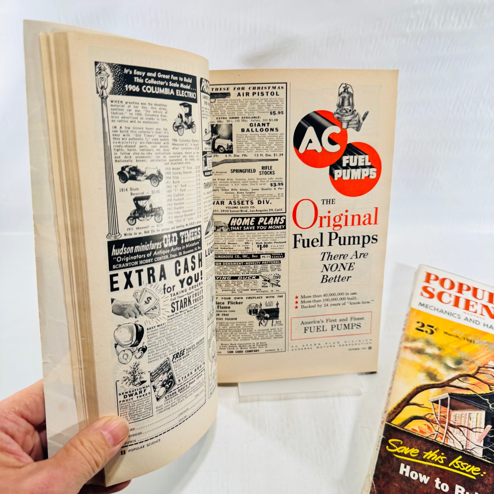 March 1951 Popular Science ad spread with Columbia kits, Stark Bro's and AC fuel pumps