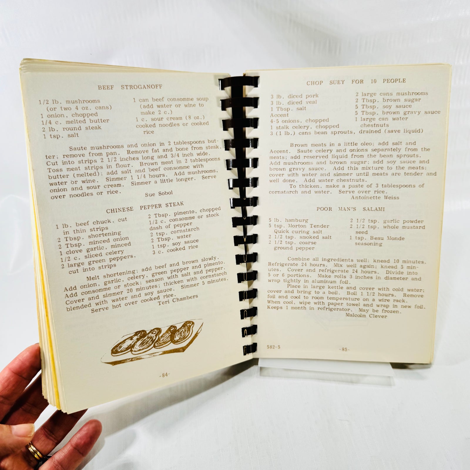Main dish recipes including Beef Stroganoff and Chop Suey, pages 84 and 85