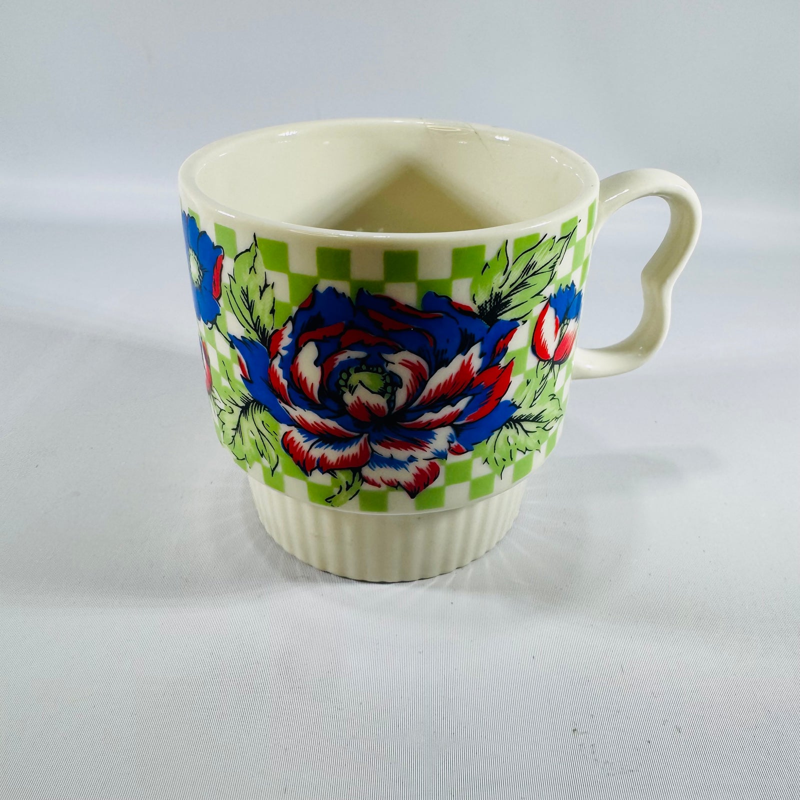 Vintage Japan Stackable Coffee Mug — Bold Blue Red Peony Floral on Green Checker, Ribbed Base, Mid-Century Export Ceramic
