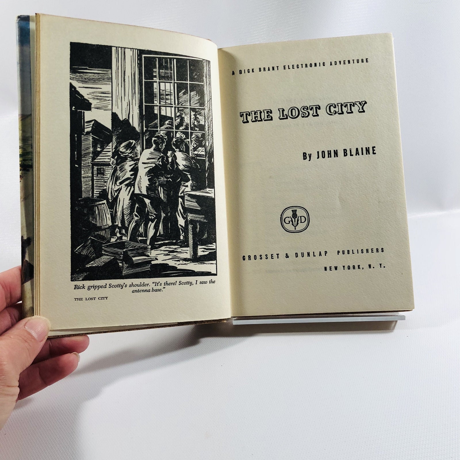 Frontispiece and title page, The Lost City, Grosset & Dunlap