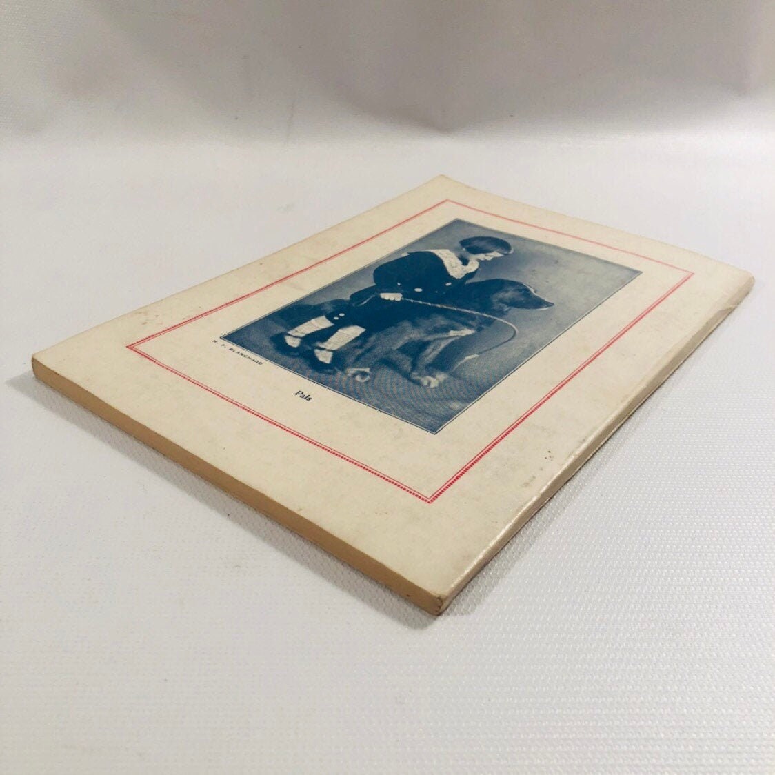 Back cover with a framed photograph, Uncle Arthur's Bedtime Stories 1928