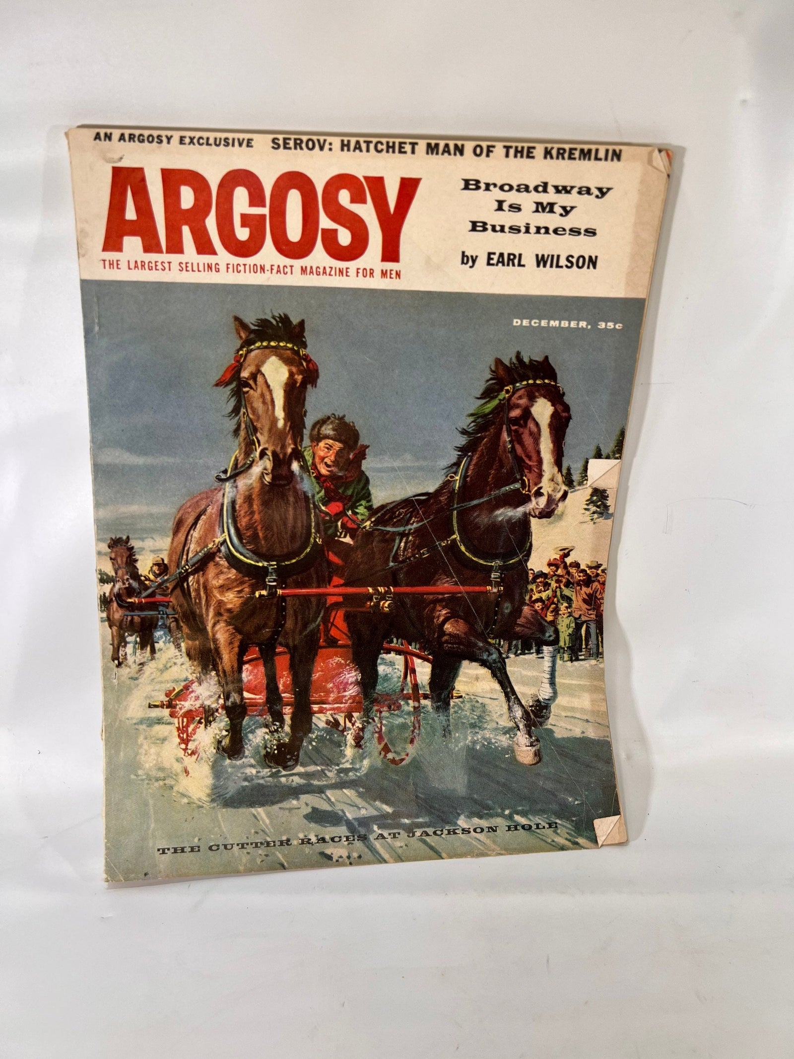 Argosy December 1957 cover, The Cutter Races at Jackson Hole horse sleigh painting
