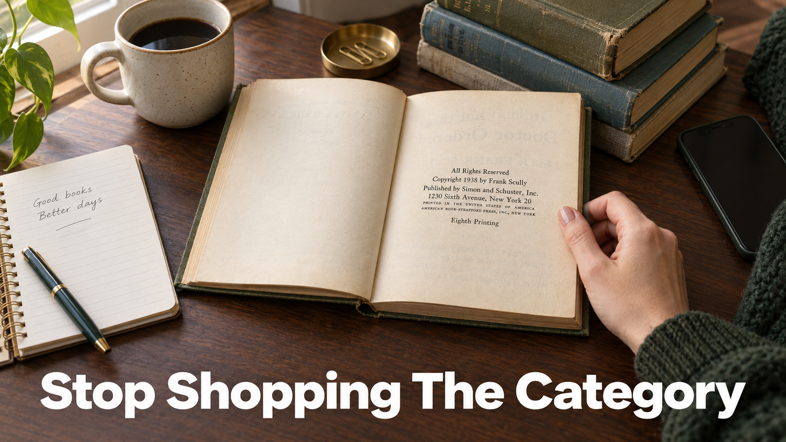 A mid century hardcover lying open to its copyright page on a dark walnut desk, a hand resting at the edge of the page, with the printed year visible and the words Stop Shopping The Category set across the lower third.