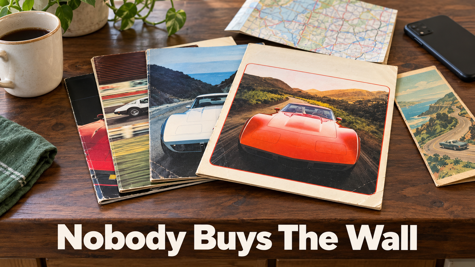 Vintage Corvette dealership brochures fanned on a kitchen counter beside a plain coffee mug, a vintage gift idea for someone who has everything