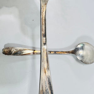 Close view of 1847 Rogers Bros IS Daffodil marks on silverplate spoon