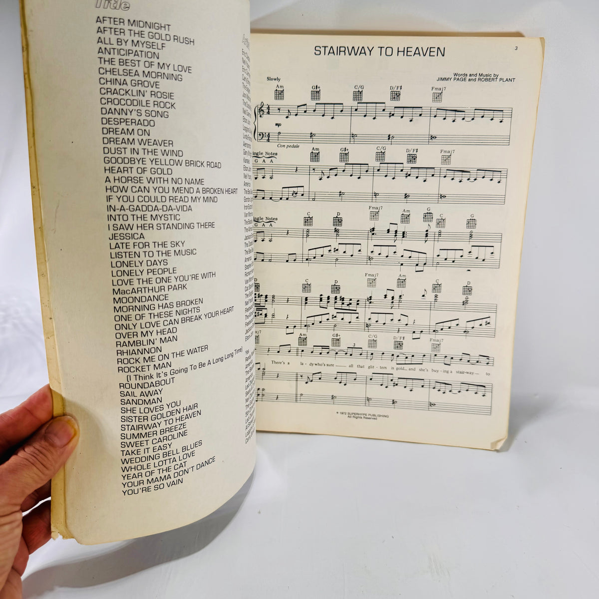 Song title list and Stairway to Heaven sheet music page with chord frames