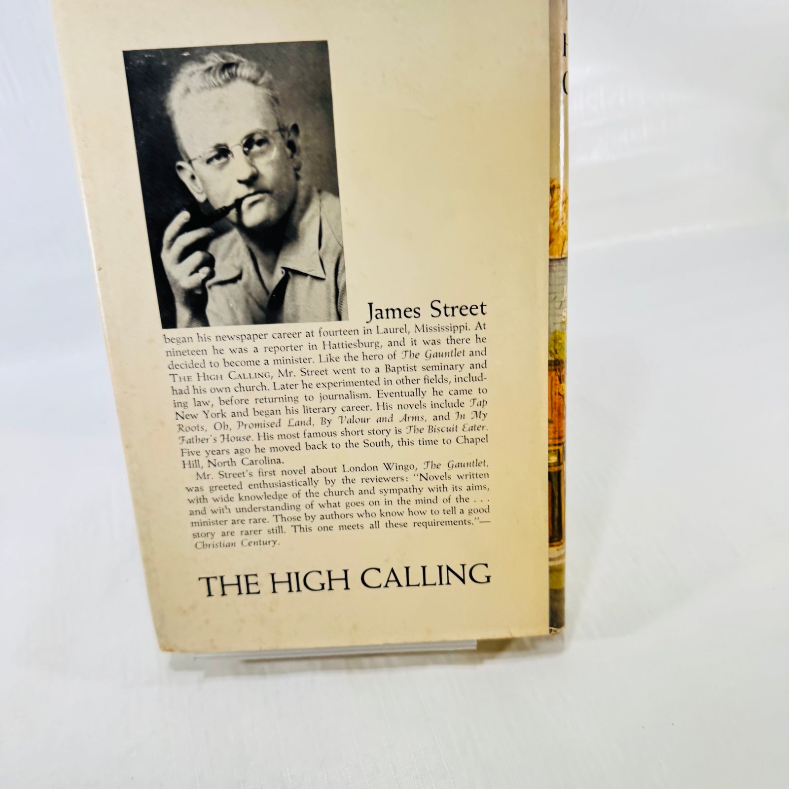 Rear jacket with author portrait and spotting
