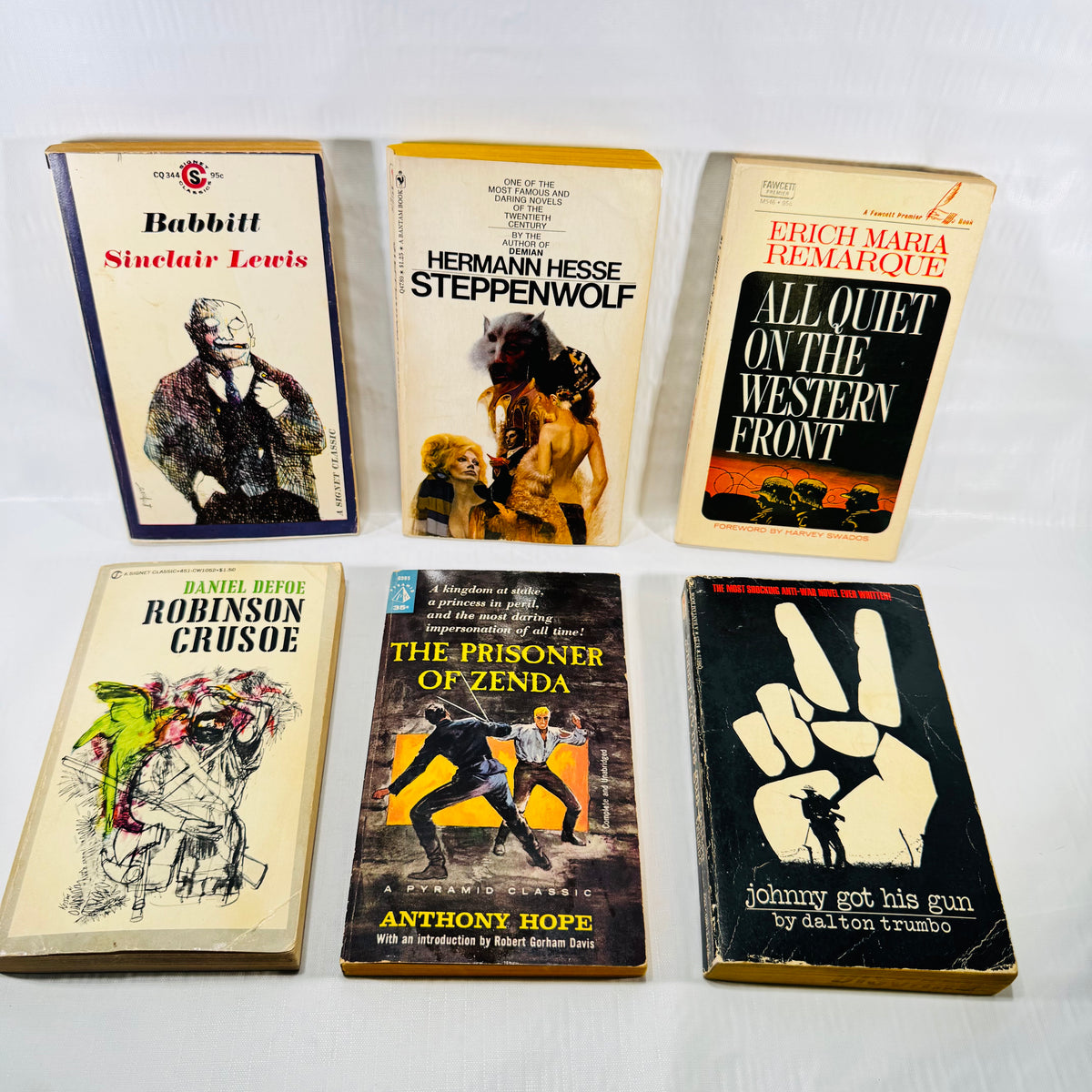 Six classic paperback books, front covers