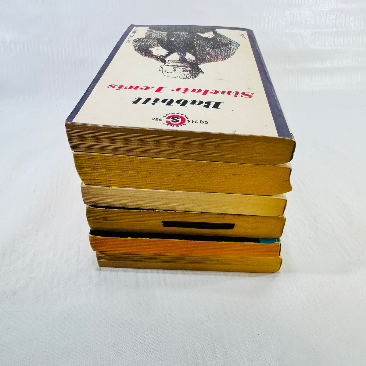 Paperback bundle page edges and black library marking