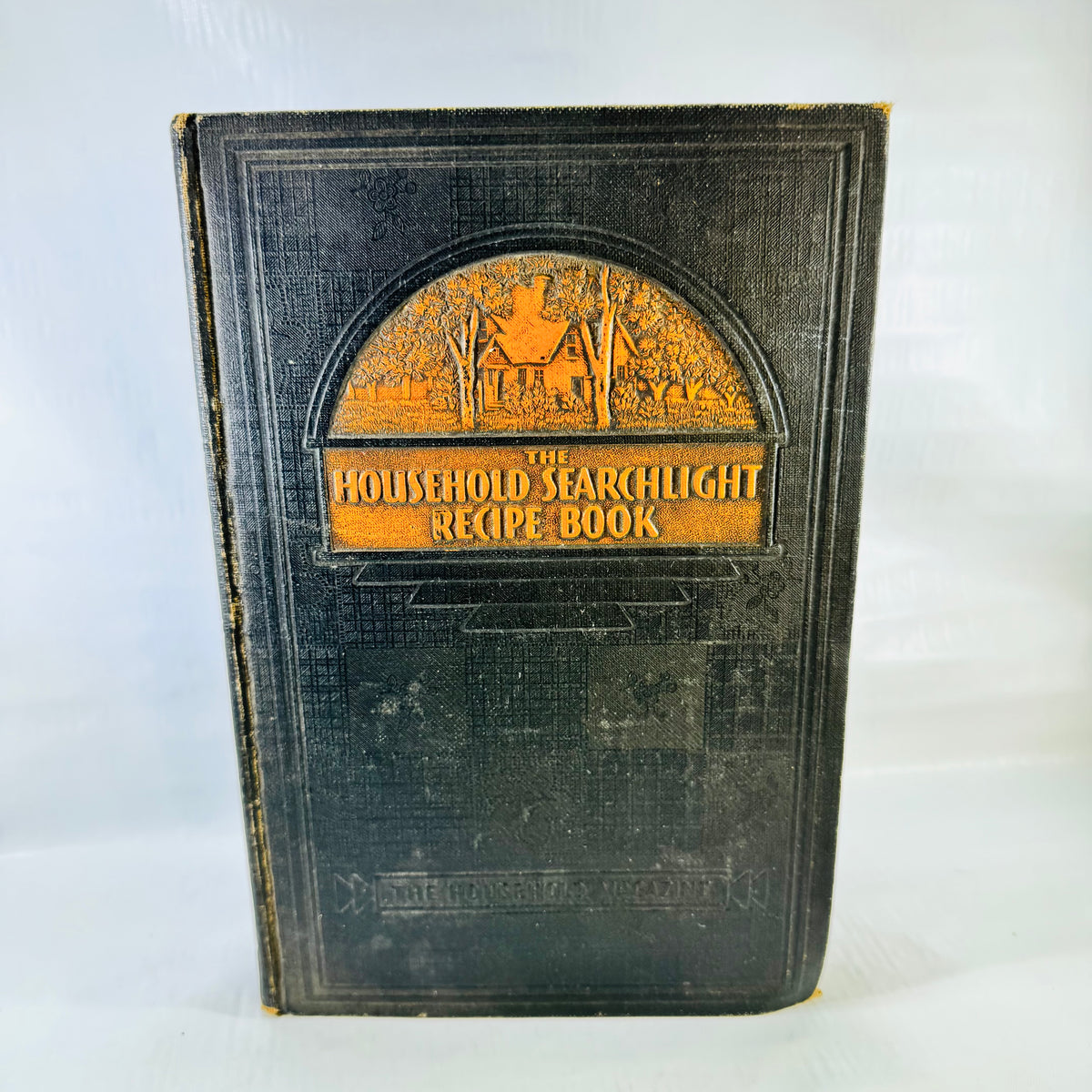Front cover with orange house decoration