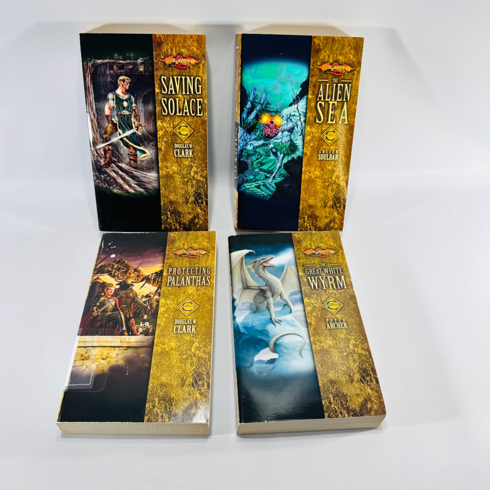 Dragonlance Champions Paperback Bundle of 4 Saving Solace Alien Sea Great White Wyrm Protecting Palanthas Wizards of the Coast