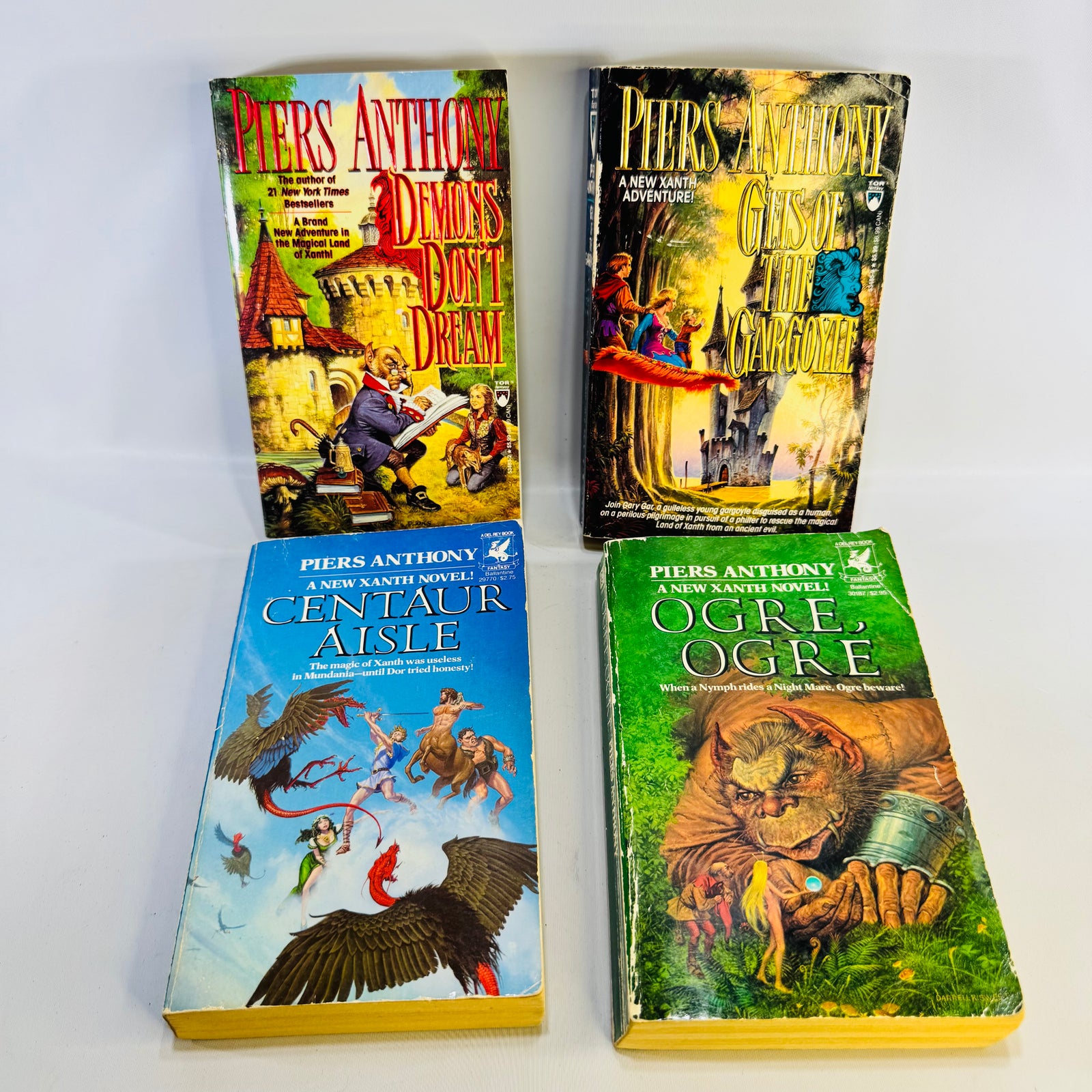 Piers Anthony Xanth Paperback Bundle Lot of 4 Centaur Aisle Ogre Ogre Demons Don't Dream Geis of the Gargoyle