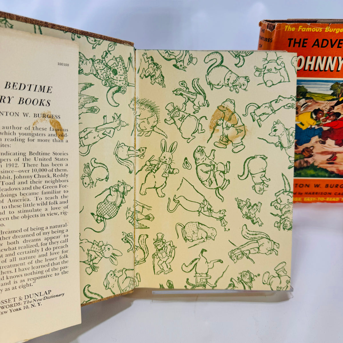 Green animal endpapers with a brown stain, Burgess Bedtime Story Books 1941