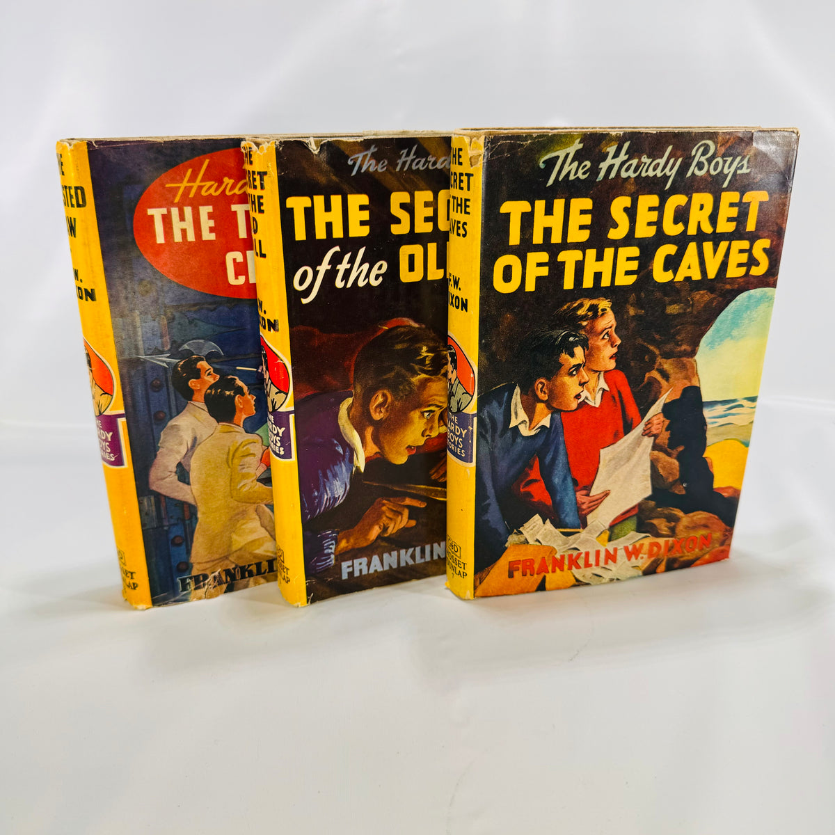 The Hardy Boys The Secret of the Old Mill 1927 The Secret of the Caves 1929 The Twisted Claw 1939 by F.W. Dixon Grosset and Dunlap
