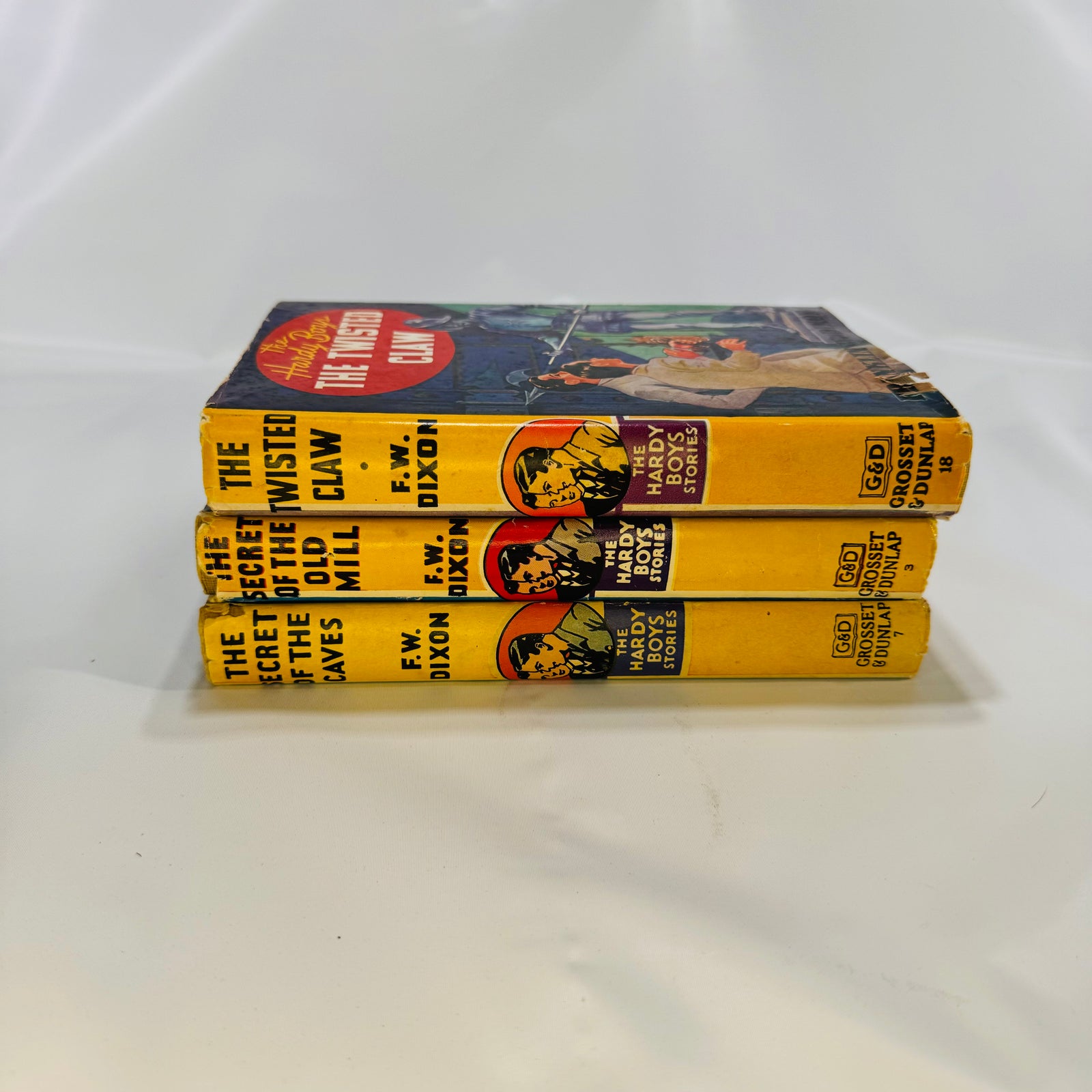The Hardy Boys The Secret of the Old Mill 1927 The Secret of the Caves 1929 The Twisted Claw 1939 by F.W. Dixon Grosset and Dunlap