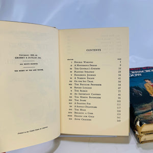 Three Hardy Boys Books by Franklin W. Dixon The Crisscross Shadow The Secret of the Lost Tunnel, The Clue in the Embers Grosset and Dunlap