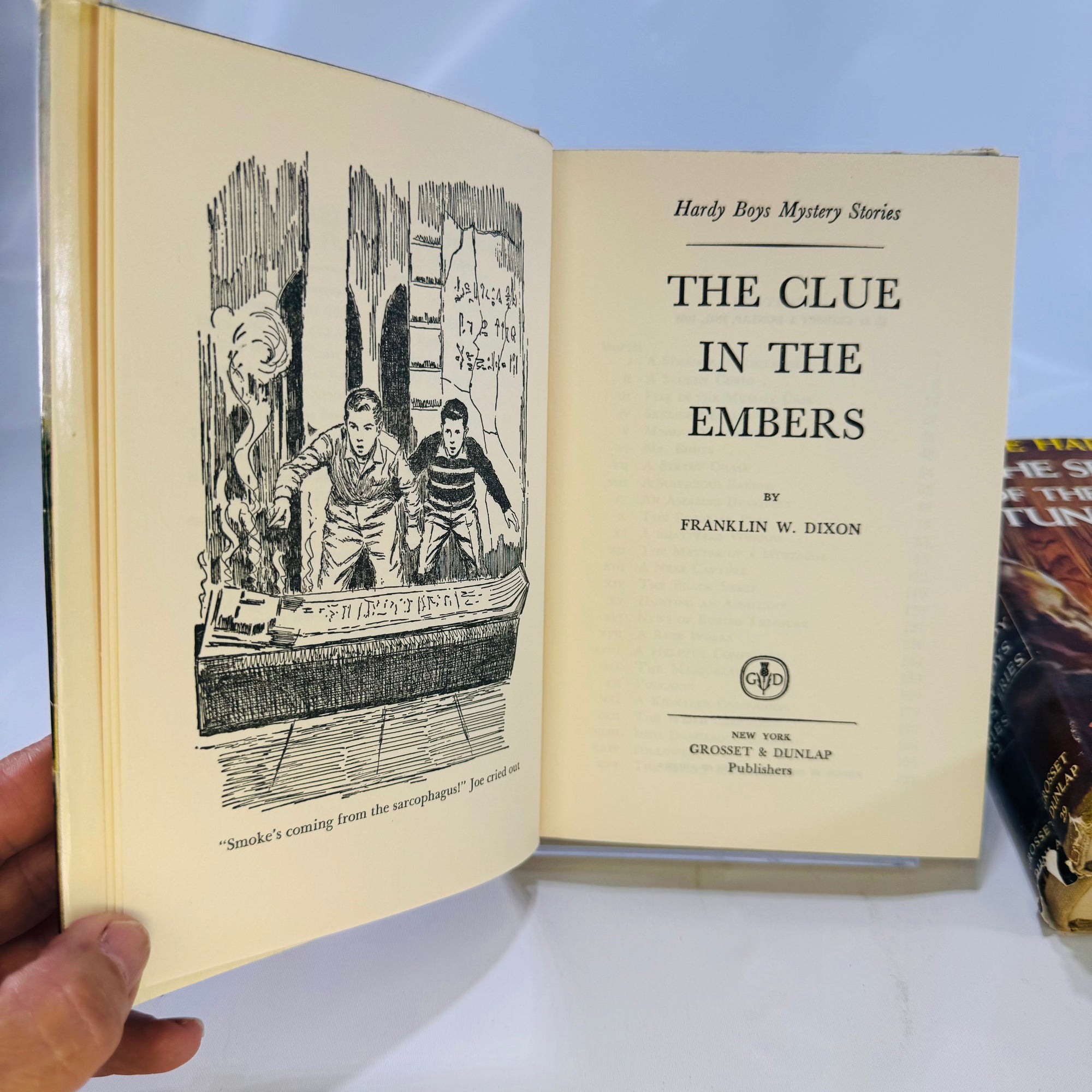 Three Hardy Boys Books by Franklin W. Dixon The Crisscross Shadow The Secret of the Lost Tunnel, The Clue in the Embers Grosset and Dunlap