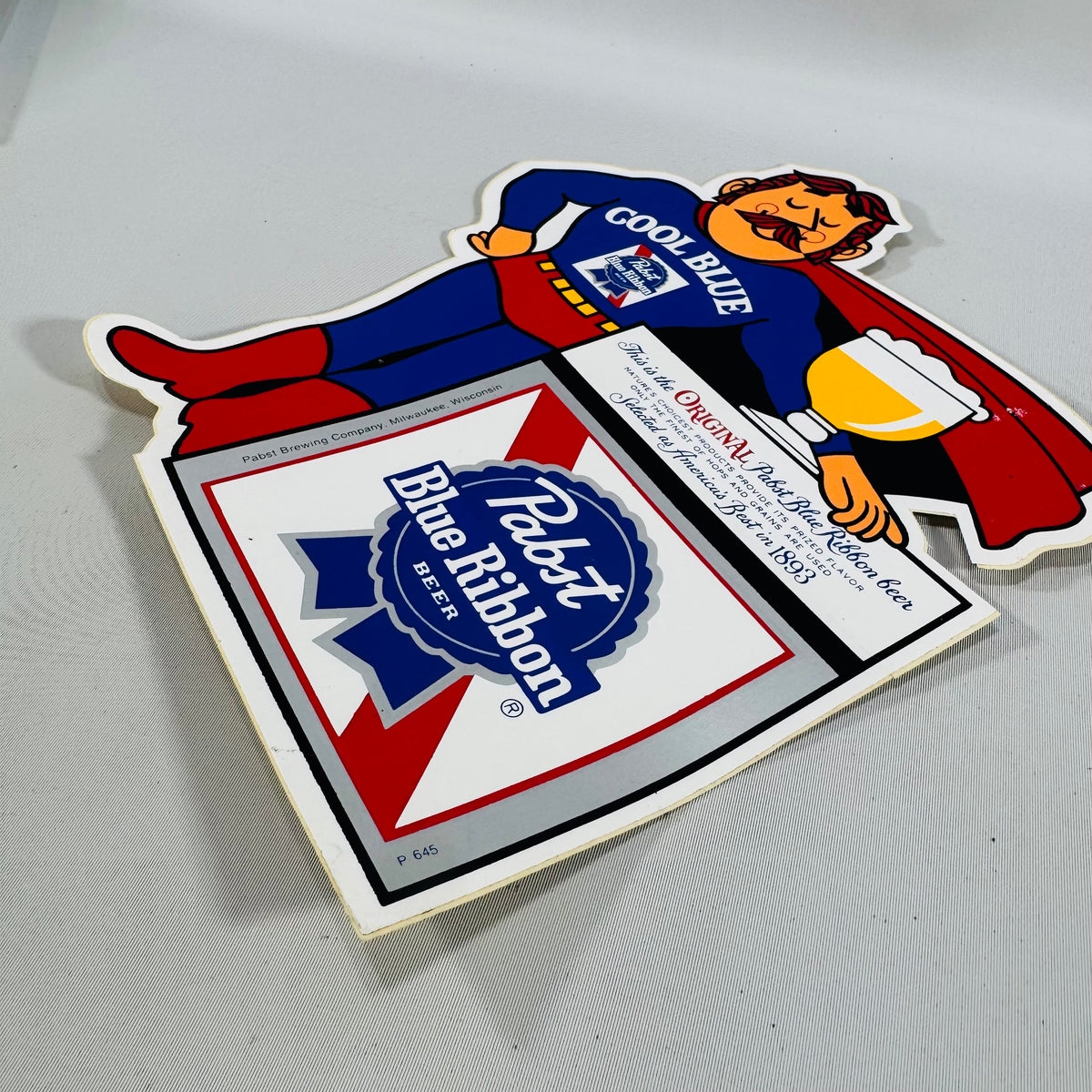 Vintage Pabst Blue Ribbon "Cool Blue" Superhero Die-Cut sticker  — PBR Breweriana Advertising Display, Pabst Brewing Company Milwaukee Wisconsin