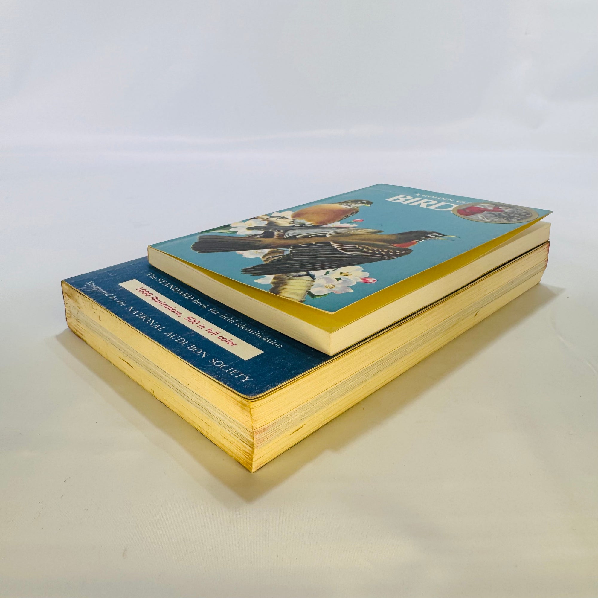 Two Paperback Birding Books: A Field Guide to the Birds by Roger Tory Peterson (1947) and A Golden Guide to Birds by Herbert S. Zim (1956) – Vintage Nature Guides