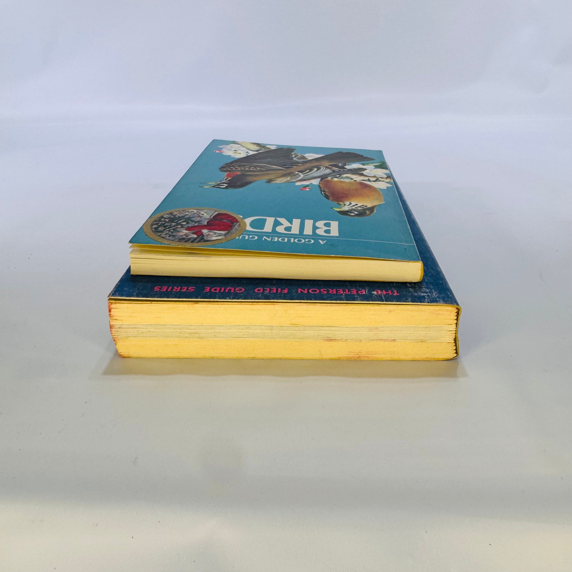 Two Paperback Birding Books: A Field Guide to the Birds by Roger Tory Peterson (1947) and A Golden Guide to Birds by Herbert S. Zim (1956) – Vintage Nature Guides