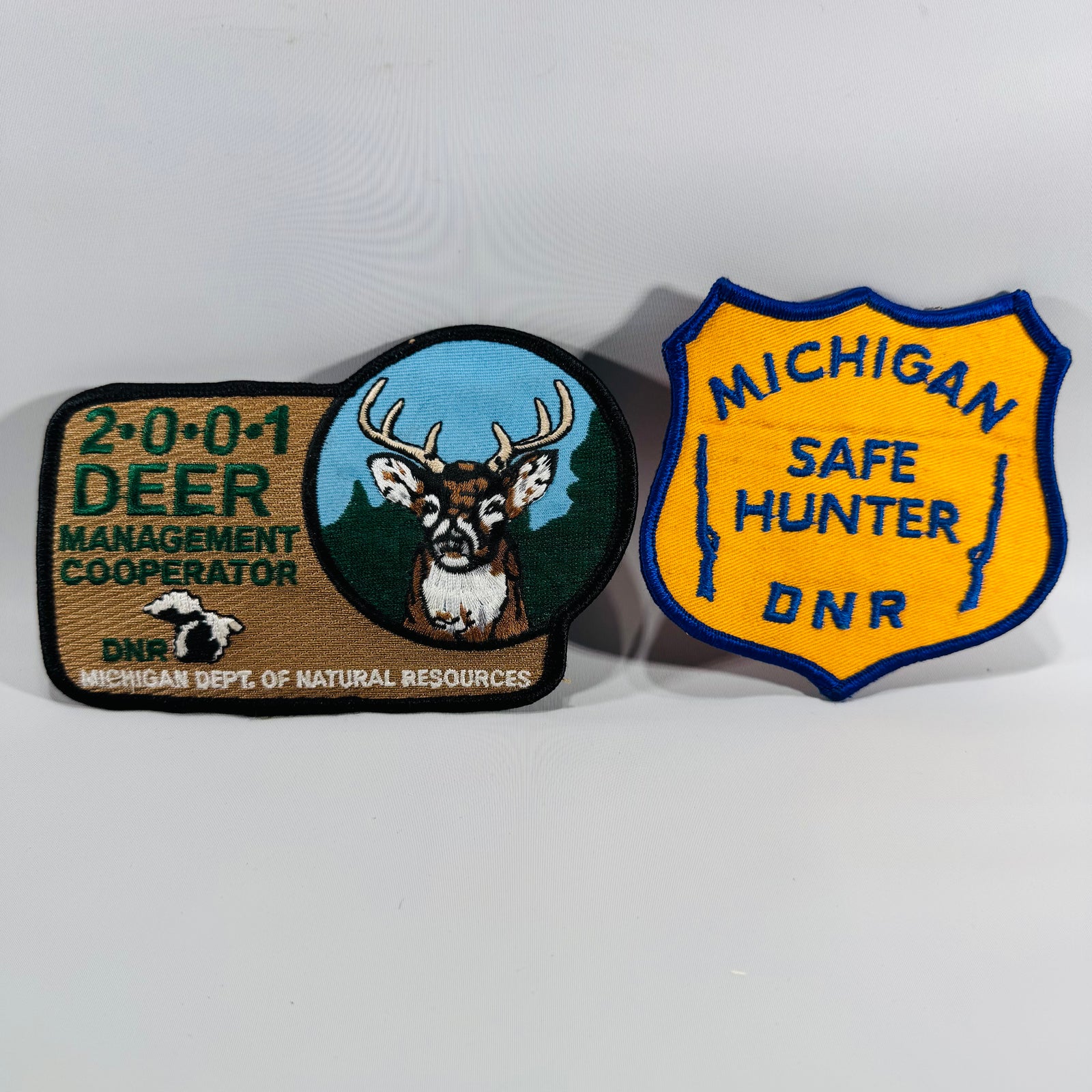 Michigan DNR Patch Set (2) – 2001 Deer Management Cooperator + Michigan Safe Hunter DNR