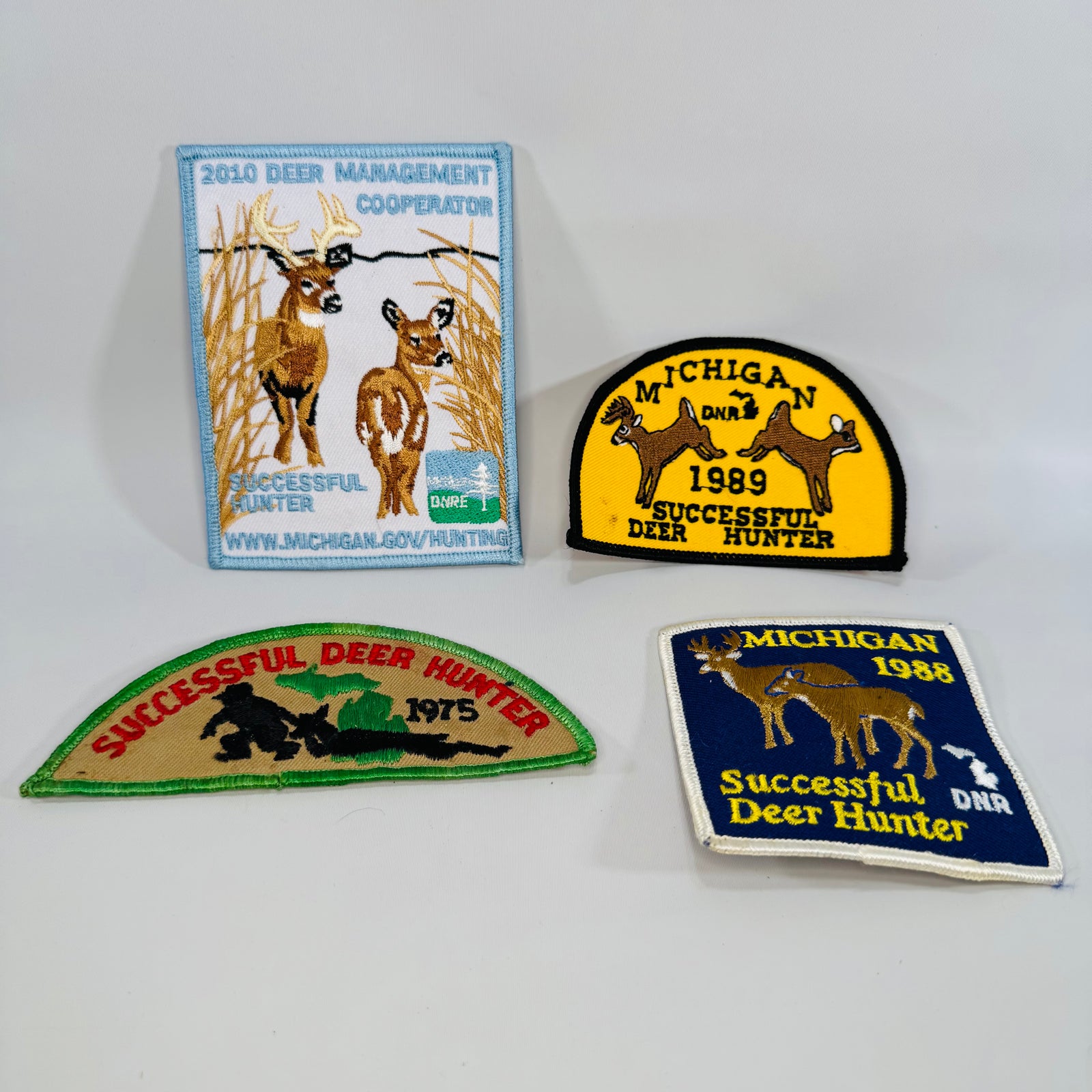 Michigan DNR Deer Patch Lot (4) — Successful Deer Hunter 1975, 1988, 1989 + 2010 Deer Management Cooperator