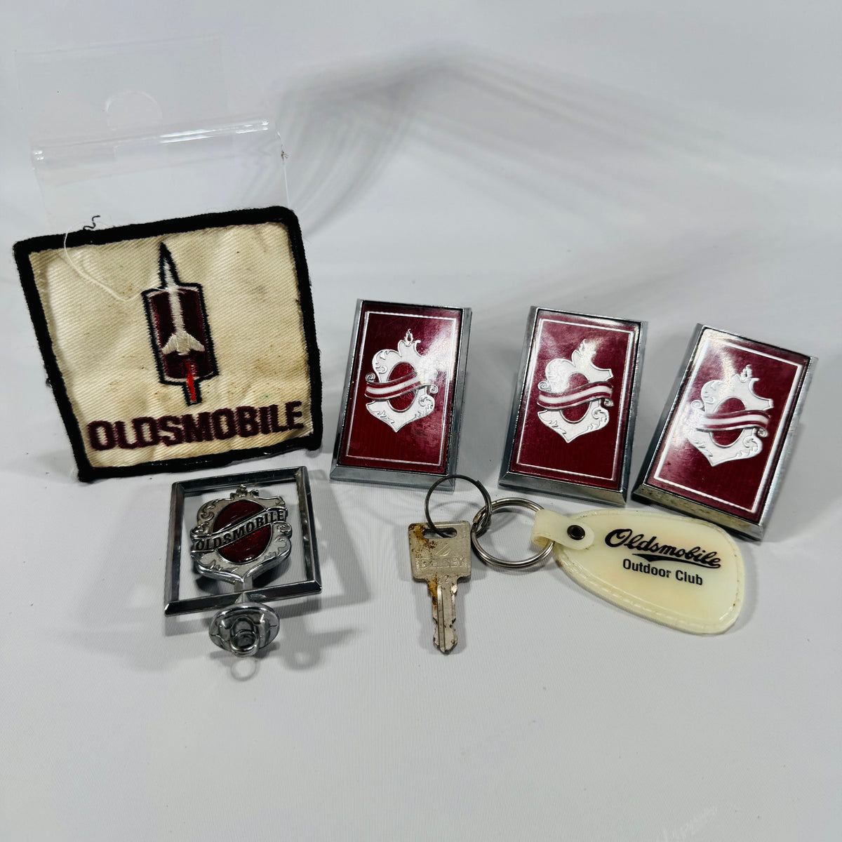 Vintage Oldsmobile Memorabilia Bundle – Patch, Keychain &amp; Emblems Lot
