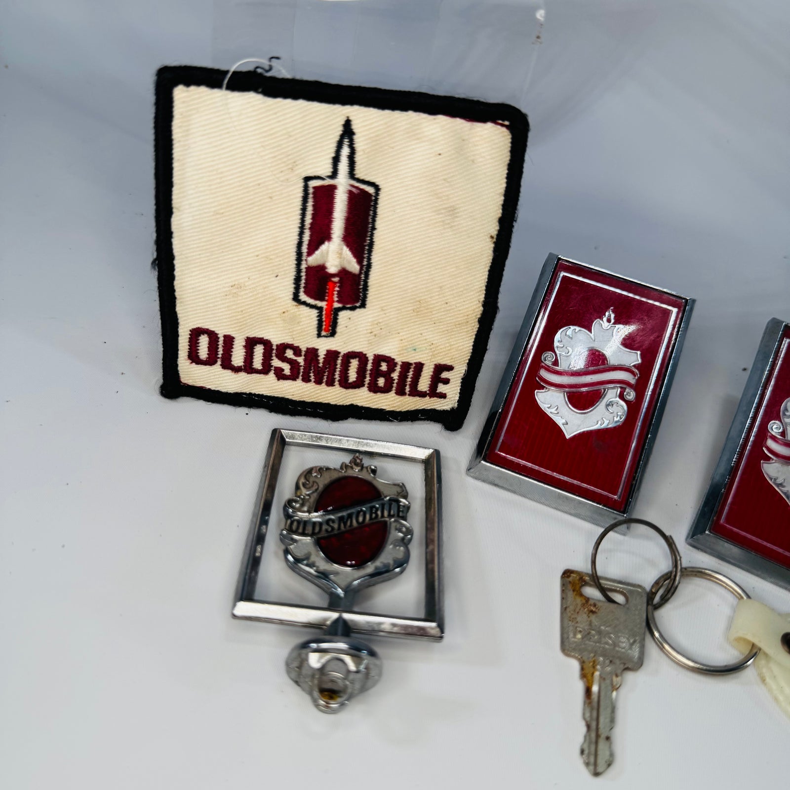 Vintage Oldsmobile Memorabilia Bundle – Patch, Keychain & Emblems Lot