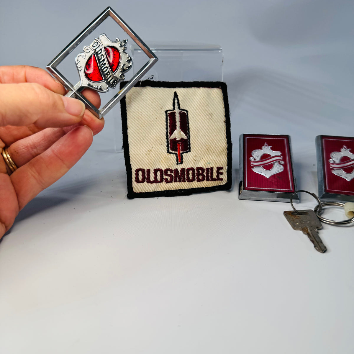 Vintage Oldsmobile Memorabilia Bundle – Patch, Keychain & Emblems Lot